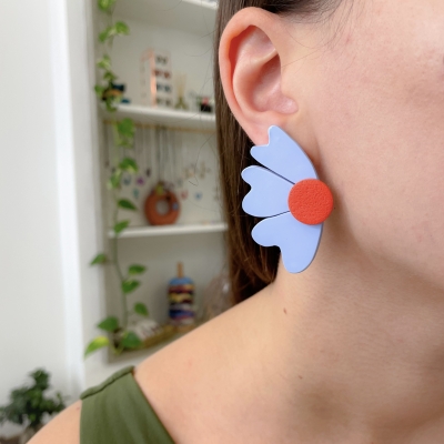 handcracted light blue abstract flower polymer clay earrings with surgical stainless steel backs