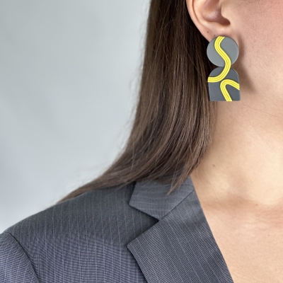 Handmade earrings in grey tones and yellow lines