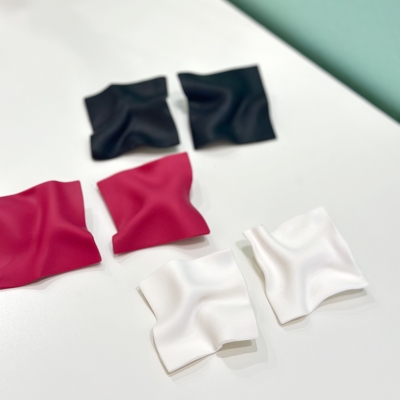 Handcrafted polymer clay earrings looks like pink cloth