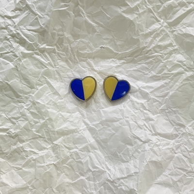 Heart shape polymer clay earrings blue an light yellow color with silver frame and stainless steel back