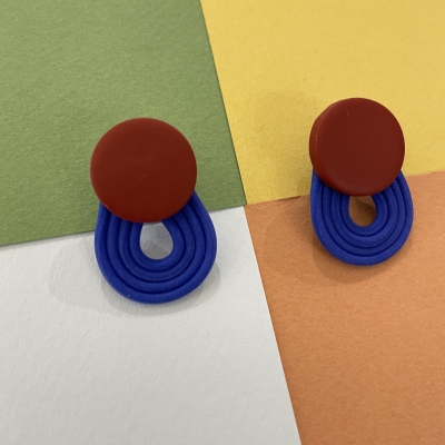 Polymer clay earrings with terracotta little circle and blue stripes