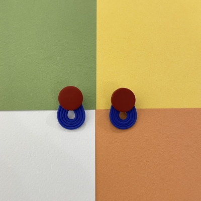 Polymer clay earrings with terracotta little circle and blue stripes