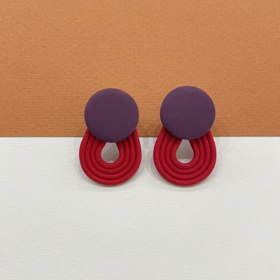 Polymer clay earrings with purple little circle with fuchsia stripes